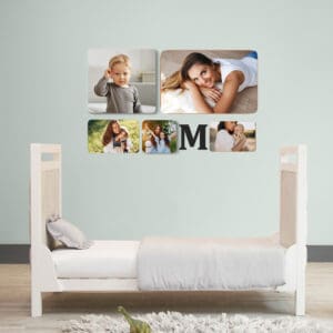 1. Fotos de família decorando quarto infantil com quadros de rosto de crianças e mãe.